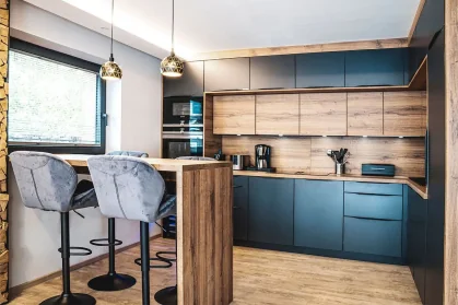 Chalet Mozart bedroom balcony overlooking High Tauern alpine peaks