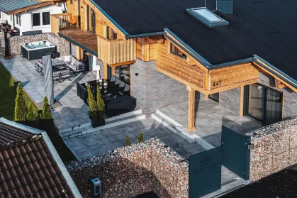 Chalet Mozart outdoor hot tub and terrace with alpine mountain view fractional ownership chalet