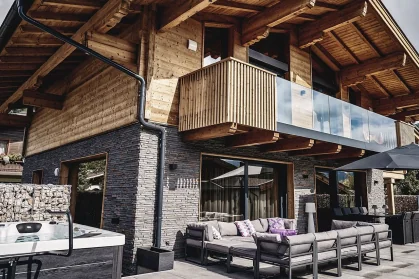 Fractional ownership luxury chalet pool deck Chalet Mozart Austria